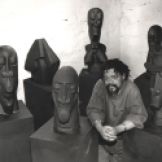 Dumile Feni with his sculptures